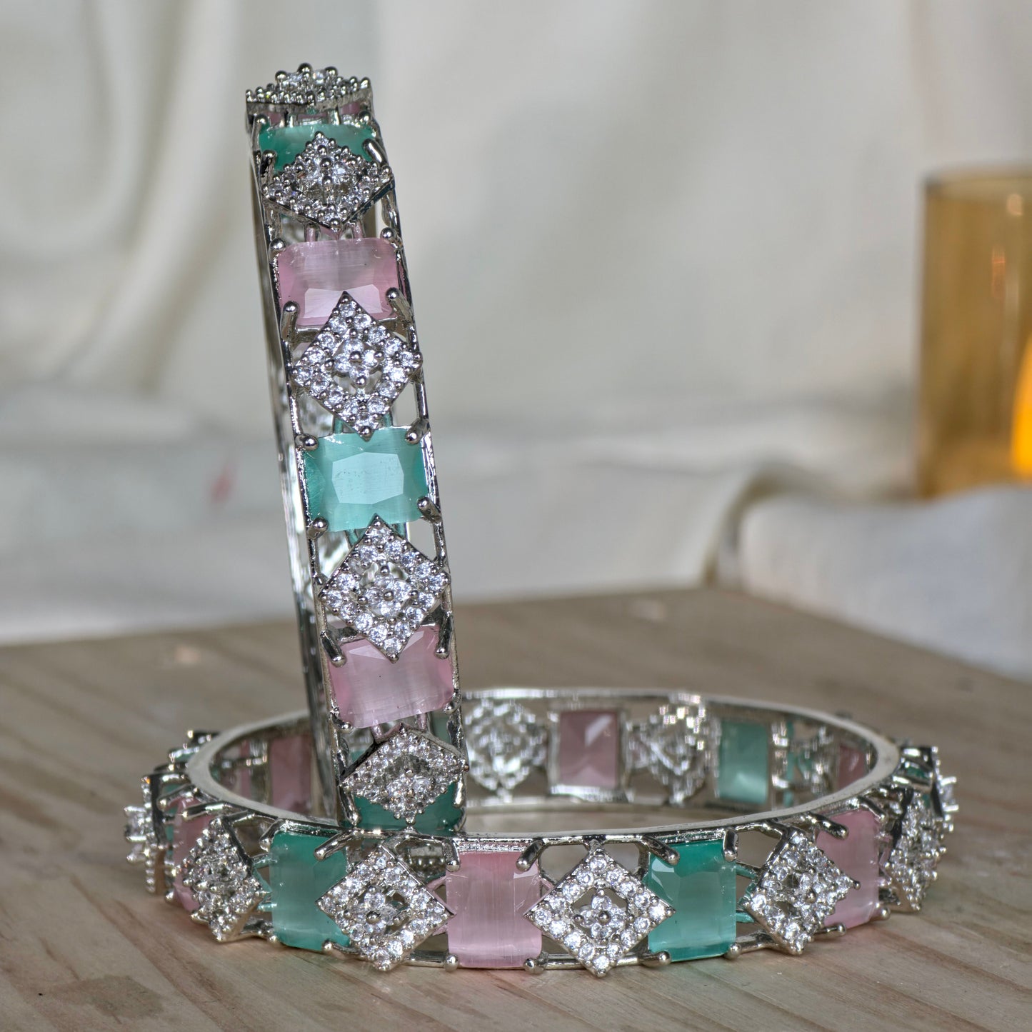 Earring with gemstones on a neutral background